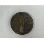 A large bronze shipping medallion commemorating the Liner "Normandie" transatlantic voyage 1938