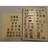 A stock book containing a collection of Scandinavia stamps including Denmark, Finland, Norway,