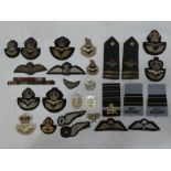 A collection of RAF badges and insignia including 1930's Officers embroidered badge,