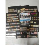 A large collection of GB postage due stamps on stock cards,