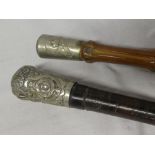 A Victorian swagger stick of the Royal Scots Fusiliers with nickel plated top and sectioned leather