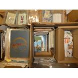 Two boxes containing various albums of World stamps, stamps in packets, boxes,