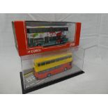 A Corgi KMB Hong Kong double decker bus and a City double decker bus,