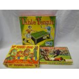 A vintage boxed table tennis set,