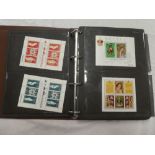 A folder album containing 1978 Coronation miniature sheets of stamps, sheetlets,