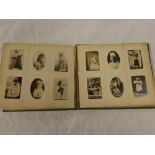 An album containing a collection of over 140 Victorian and Edwardian cigarette cards - mainly