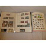 A folder album and stock book containing a collection of South Africa mint and used stamps