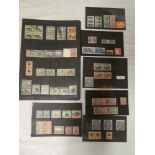 Various stock sheets and cards containing a selection of South Africa stamps 1910-1954,