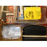 Two boxes containing empty Prinz stamp leaves and postcard protectors and selection of stamp