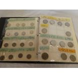 An album of GB coins including silver and other half crowns including 1912, 1914, 1915,