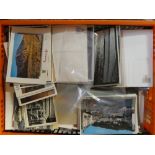 A box containing a selection of mainly modern postcards