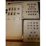 Three printed folder albums containing a collection of Canada mint and used stamps 1948-2005