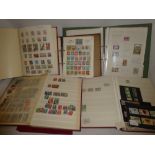Six albums/stock books containing a selection of GB and World stamps