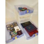 A three drawer display cabinet containing a collection of GB coins including last sterling and