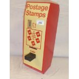 A counter-top £1 stamp booklet dispenser circa 1989
