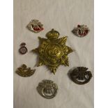 A Duke of Cornwall's Light Infantry brass ordinary ranks valise badge,