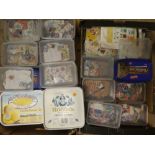 Two large boxes containing numerous packets of GB and Commonwealth stamps on/off paper