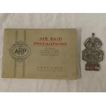 An unusual ARP chromium plated vehicle badge and an album of Wills cigarette cards "Air Raid