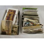 A large selection of various black & white and coloured postcards - topographical,