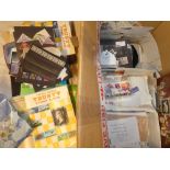 A box containing various albums of World stamps, packets of stamps, stamps on stock cards,