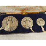 A 1969 Britannia silver Prince of Wales Investiture three-piece coin set by John Pinches of London,
