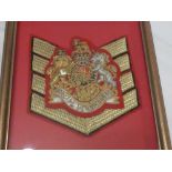 A framed display of a Brigade of Guards Garrison Sergeant Majors embroidered wire arm badge