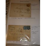 A folder album containing a collection of France stamps - Paris Railway Station postal history and