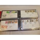 Two albums containing a selection of over 90 GB first day covers 1969-2003