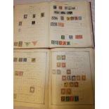 Two Ideal postage stamp albums containing a collection of British Empire and Colonies/World stamps