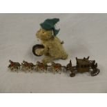 A clockwork plush covered monkey with cymbals and a Crescent toys Coronation coach set (2)