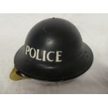 A Second War Home Service Police helmet dated 1941