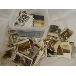 A large selection of various black & white and coloured postcards - topographical, foreign,