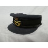 An E11R WRAF Officers peaked cap with bullion embroidered badge