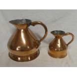 Two 19th Century copper measures - half gallon and pint with loop handles