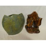 A large studio pottery oval green glazed vase,