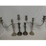 A pair of George V silver baluster-shaped candlesticks on circular bases, London marks 1925,