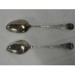 Two 18th Century silver serving spoons with scallop decoration,