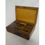 A 19th Century tortoiseshell mounted mahogany rectangular workbox with fitted compartments enclosed