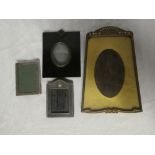 A small silver mounted rectangular photo frame, ebonised and gilt miniature frame,