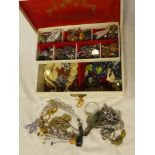 A jewellery box containing a quantity of various costume jewellery
