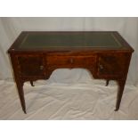 A late Victorian inlaid mahogany rectangular writing desk with a single drawer in the frieze