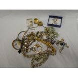 A selection of various costume jewellery including necklaces, bracelets, earrings,