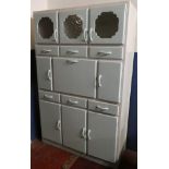 A 1960's painted kitchen cabinet with six drawers,