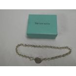 A Tiffany silver chain-link necklace with Tiffany oval emblem,