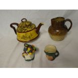 A Royal Doulton pottery teapot with transfer landscape decoration (af);