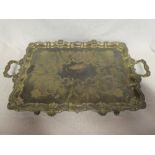 A large silver plated rectangular two handled tea tray with decorated edge and engraved floral