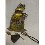 A brass companion stand in the form of a sailing galleon with attached fire irons