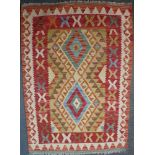 A small Eastern flat weave rug with geometric decoration,