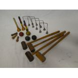 An old table croquet game including four mallets, four balls, hoops,