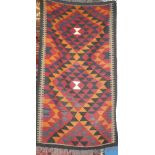 An Eastern flat-weave rectangular rug with geometric decoration 68" x 36"